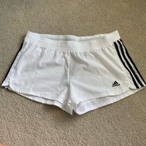 Woman’s adidas shorts.